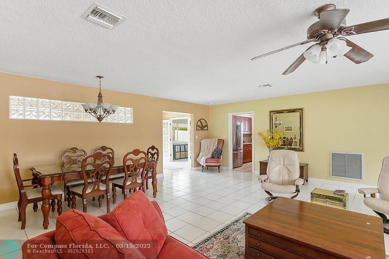 1948 Sailfish Place Lauderdale-by-the-Sea, FL 33062 - Photo 7 of 33 a living room with furniture