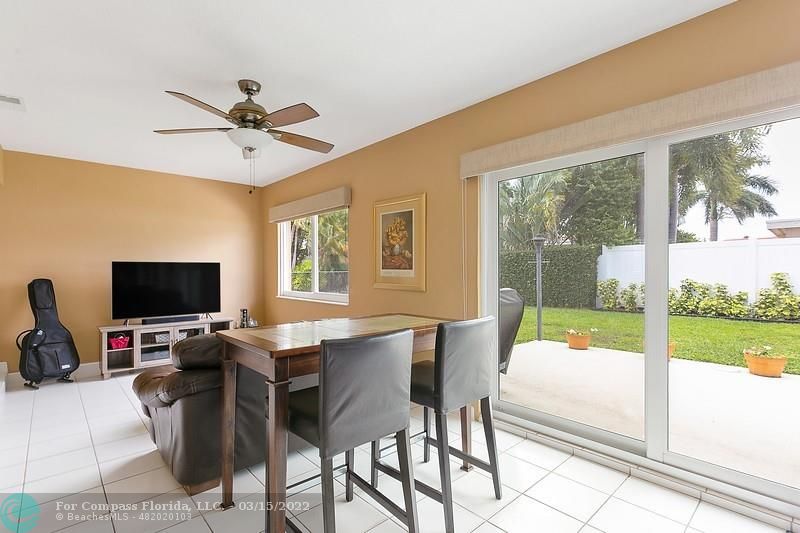 1948 Sailfish Place Lauderdale-by-the-Sea, FL 33062 - Photo 10 of 33 a view of a dining room with furniture window and outside view