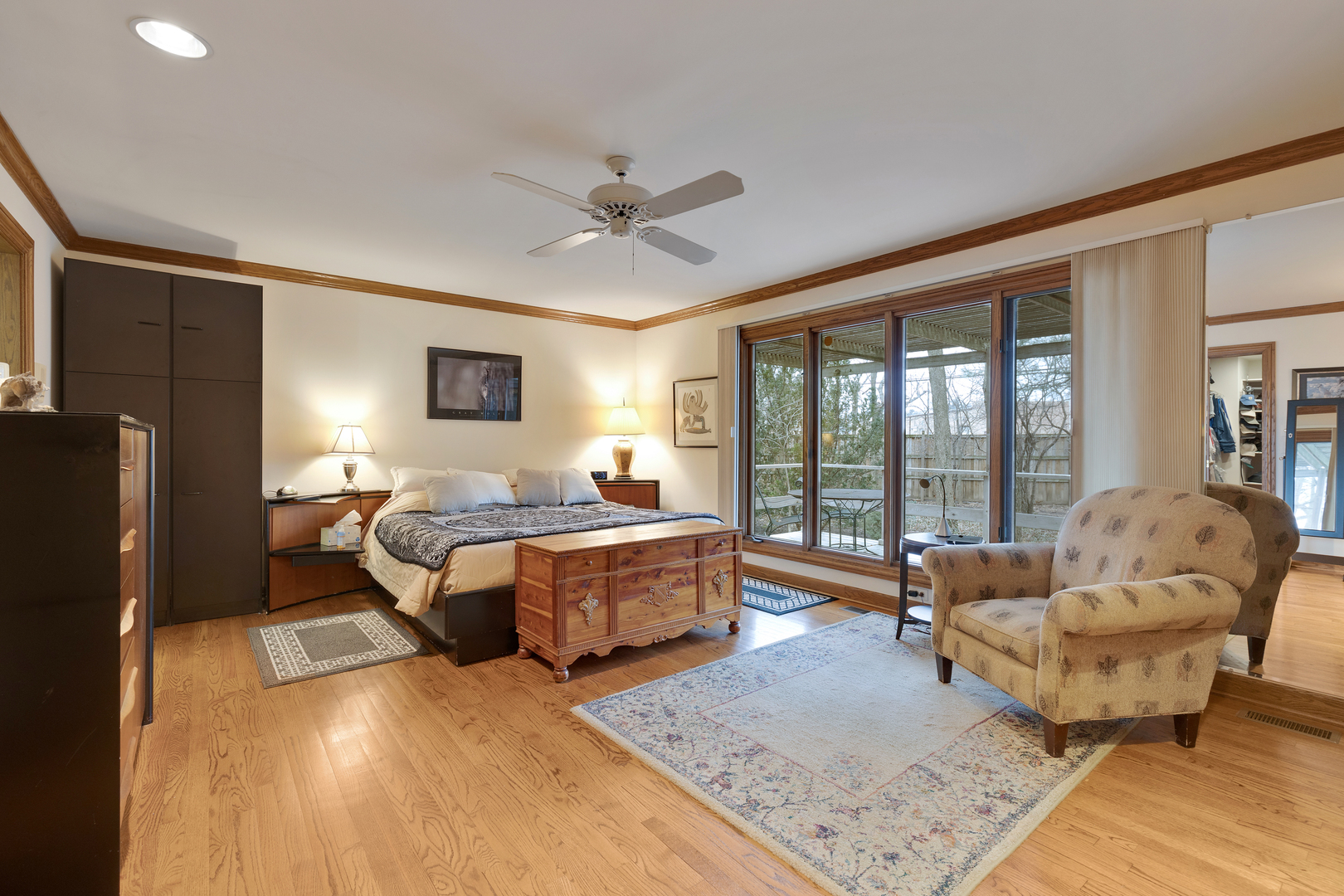 1133 Edgewater Drive Naperville, IL 60540 - Photo 14 of 37 a living room with furniture and a large window