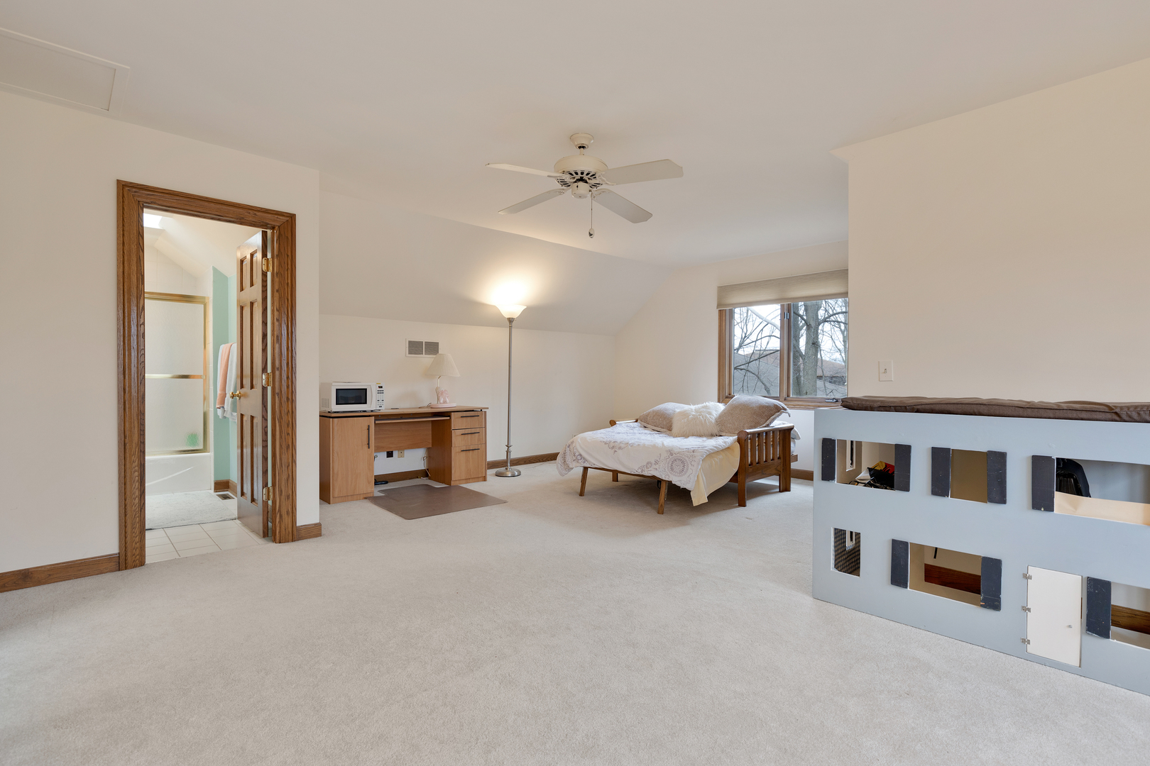 1133 Edgewater Drive Naperville, IL 60540 - Photo 24 of 37 a living room with furniture and a chandelier