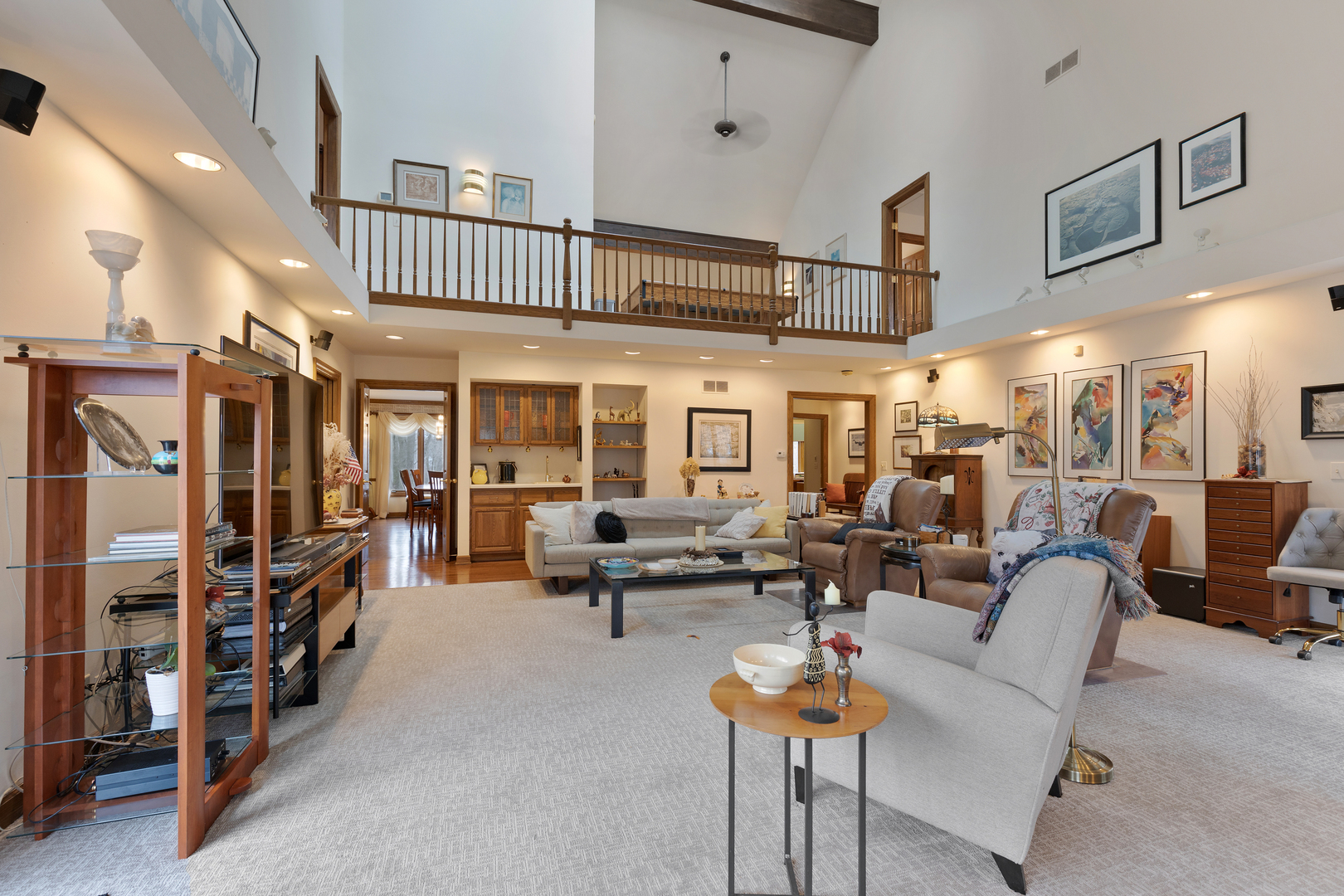 1133 Edgewater Drive Naperville, IL 60540 - Photo 6 of 37 a living room with furniture and a flat screen tv