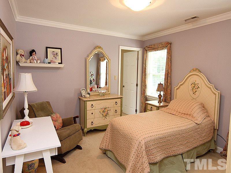 2712 Farnborough Road Raleigh, NC 27613 - Photo 13 of 25 Bedroom #2 off hall on 2nd floor with connecting bonus room makes for great Study, craft room, playroom, exercise or media room.