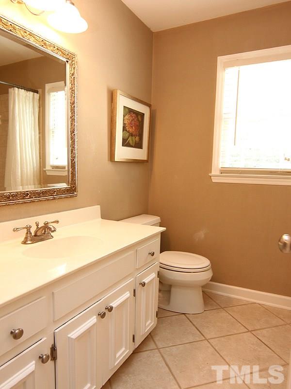 2712 Farnborough Road Raleigh, NC 27613 - Photo 16 of 25 Bathroom 2 on 2nd floor with tiled floor and tub/shower. Neutral palette