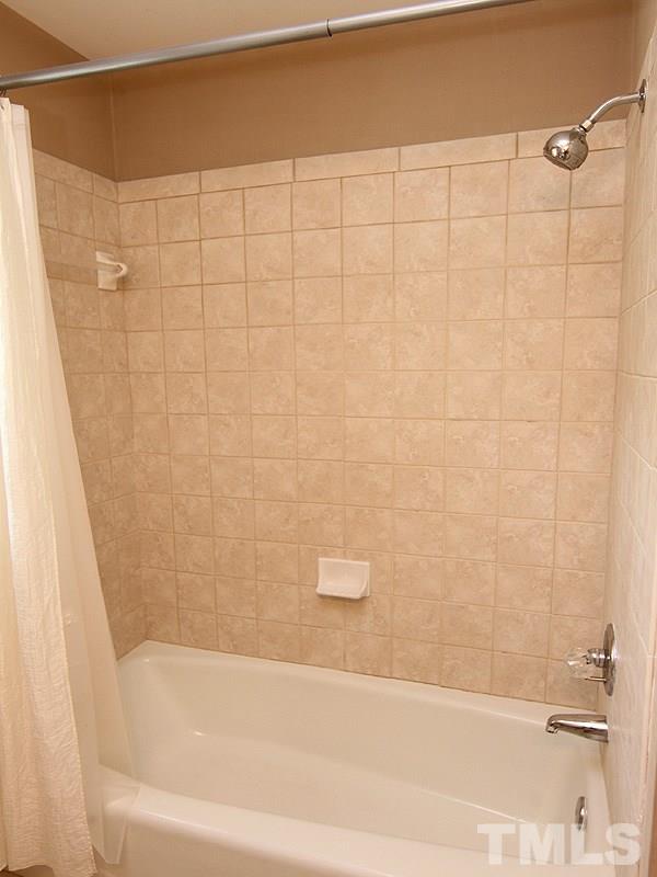 2712 Farnborough Road Raleigh, NC 27613 - Photo 17 of 25 Bath #2 on 2nd floor tiled tub/shower view