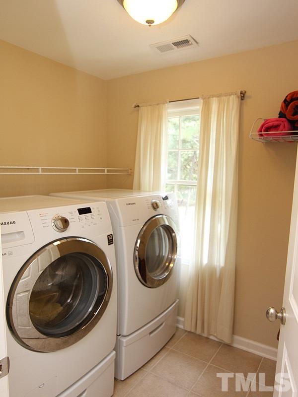 2712 Farnborough Road Raleigh, NC 27613 - Photo 18 of 25 Walk-in Laundry room on 2nd floor