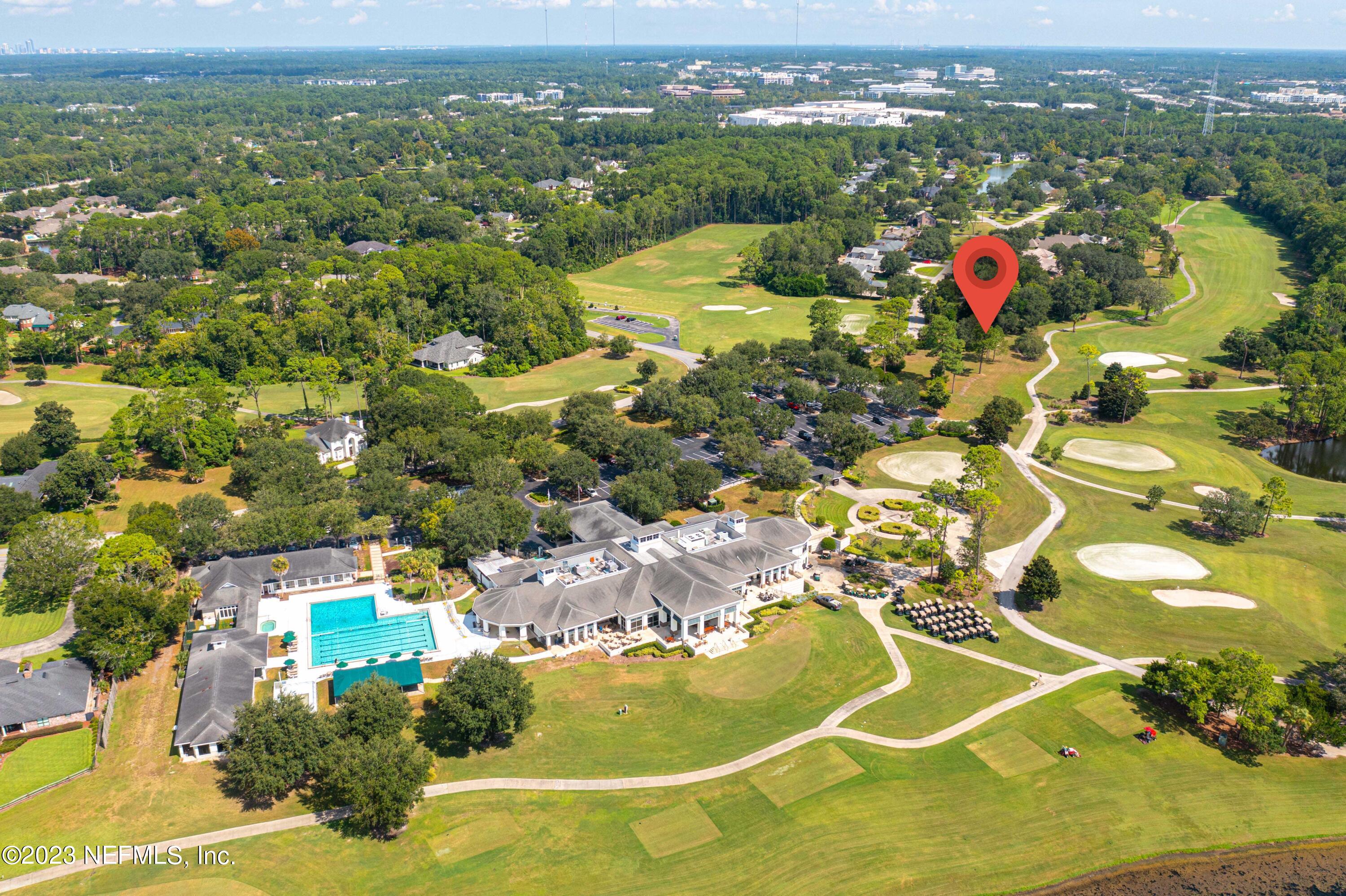 A Hollyridge Road Jacksonville, FL 32256 - Photo 13 of 28 an aerial view of residential houses with outdoor space