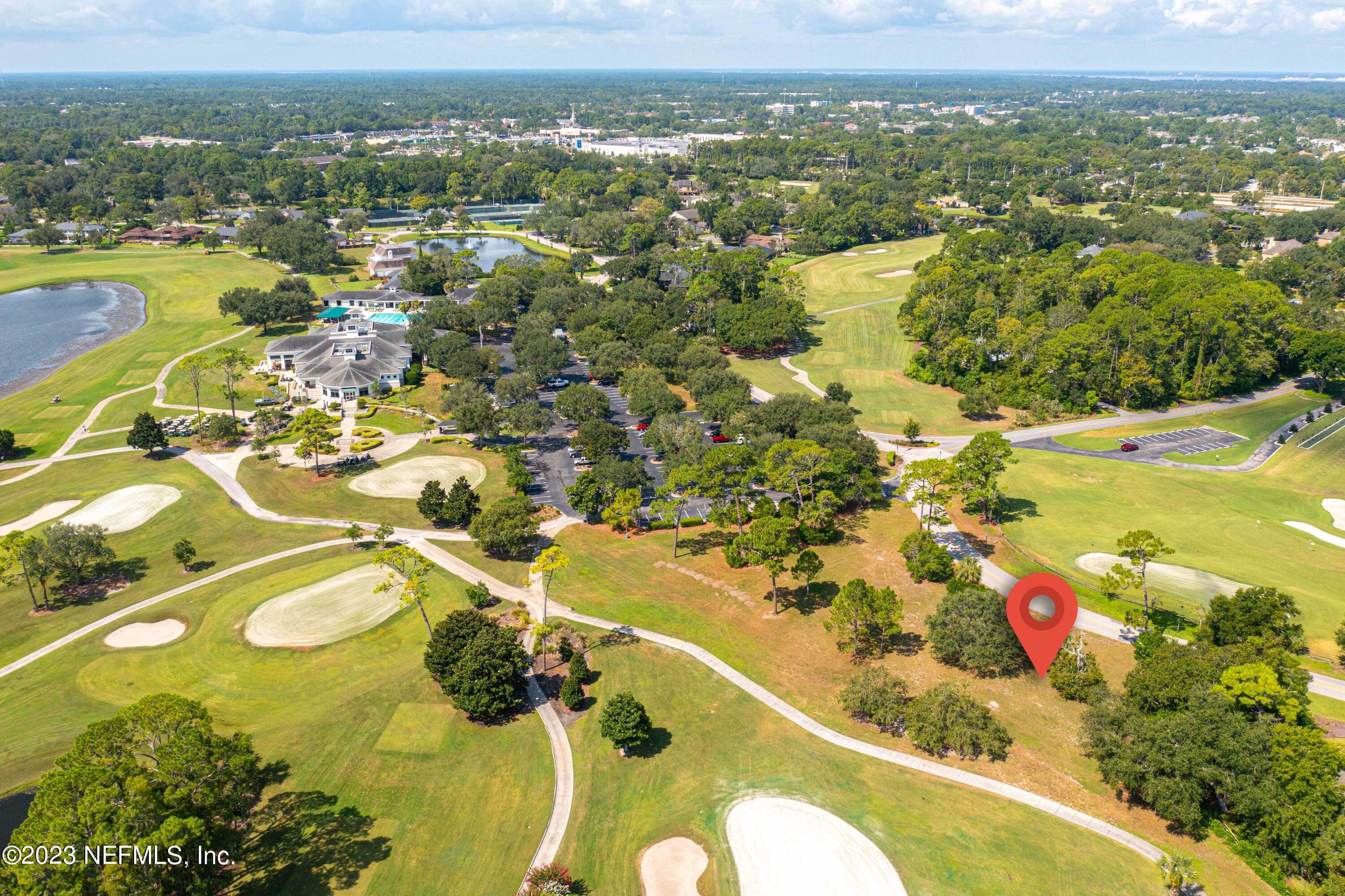 A Hollyridge Road Jacksonville, FL 32256 - Photo 14 of 28 an aerial view of residential houses with outdoor space