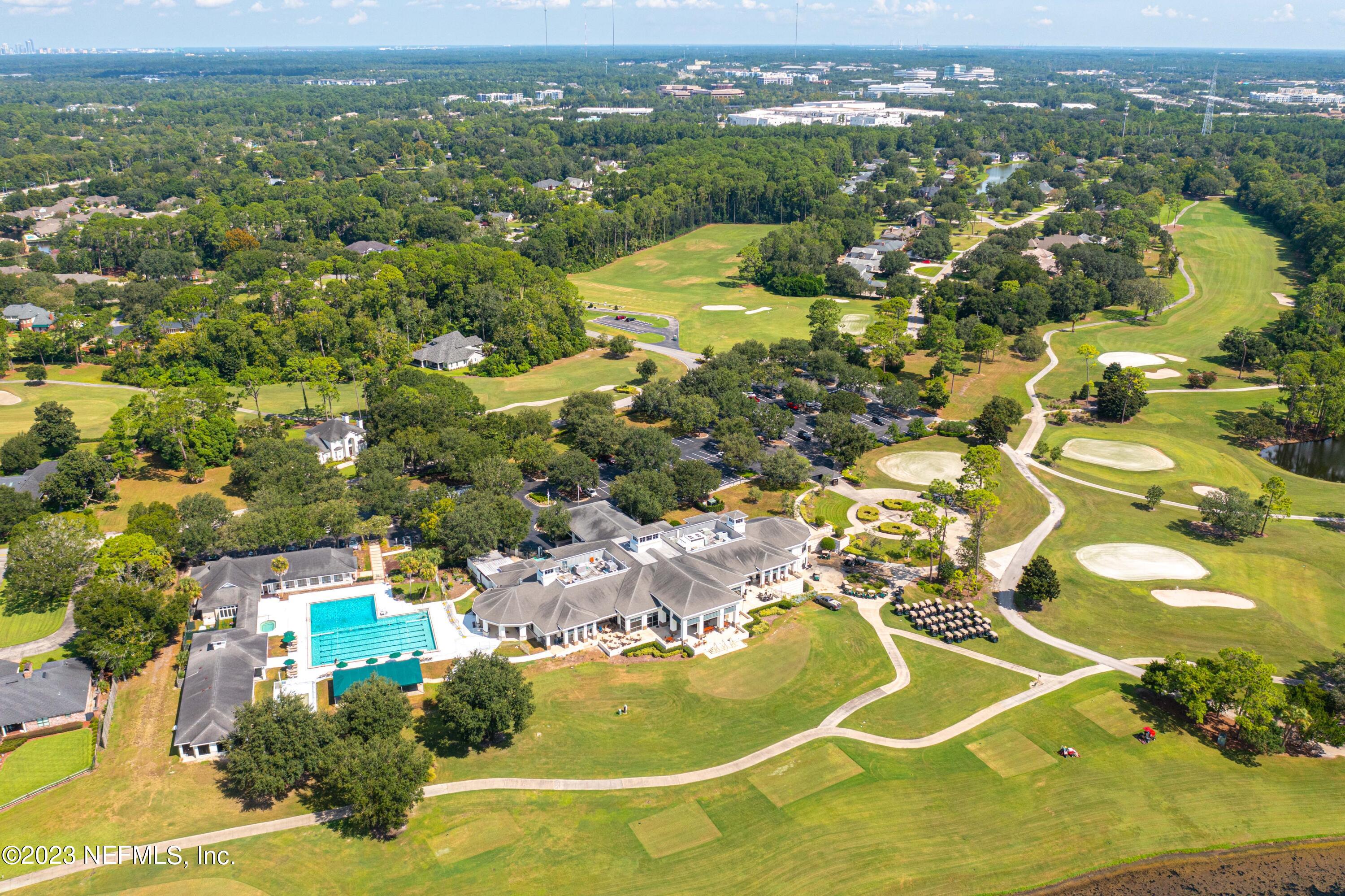 A Hollyridge Road Jacksonville, FL 32256 - Photo 16 of 28 an aerial view of residential houses with outdoor space