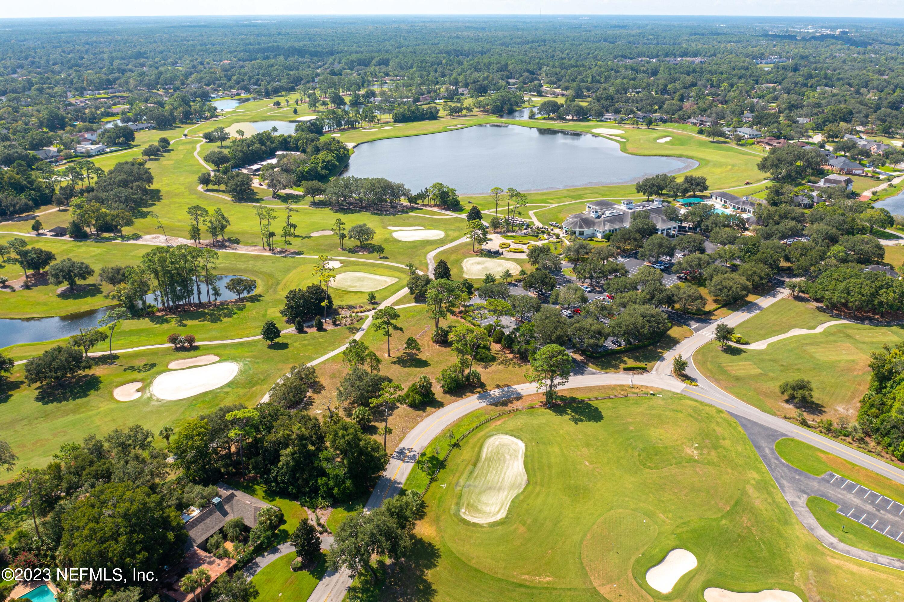 A Hollyridge Road Jacksonville, FL 32256 - Photo 20 of 28 an aerial view of residential house with swimming pool and ocean view