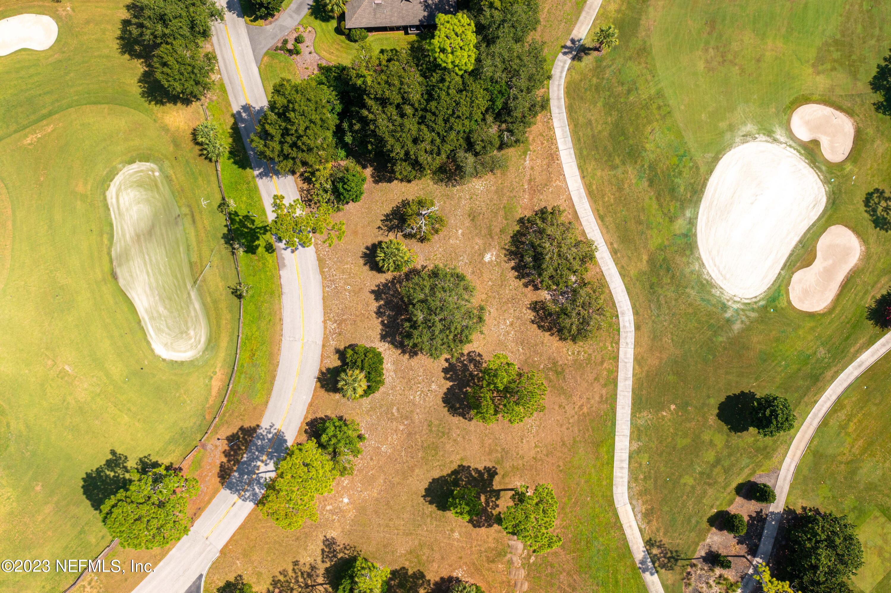A Hollyridge Road Jacksonville, FL 32256 - Photo 2 of 28 a bathroom with a sink mirror and vanity