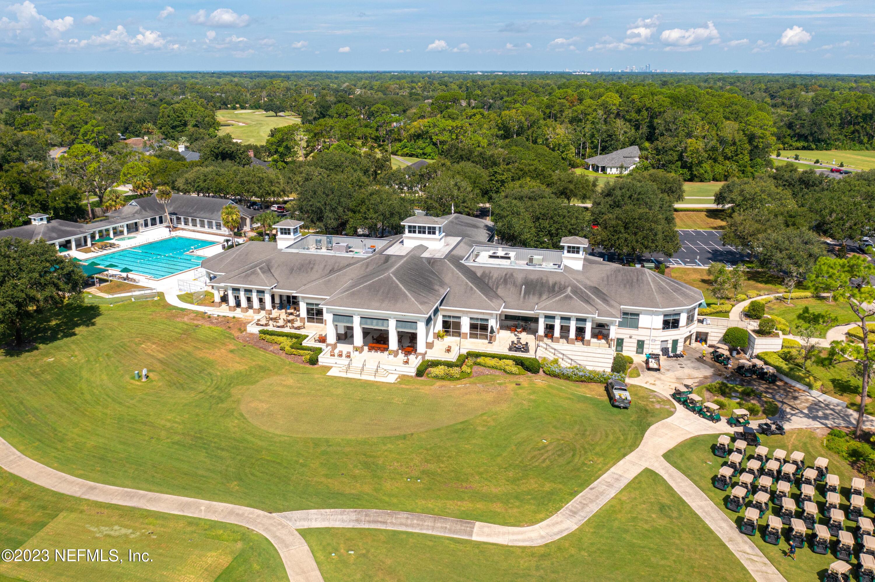 A Hollyridge Road Jacksonville, FL 32256 - Photo 26 of 28 an aerial view of residential houses with outdoor space and swimming pool