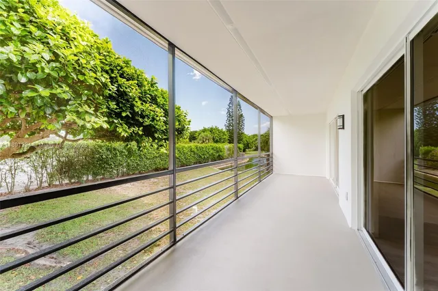 a view of a balcony with an outdoor space