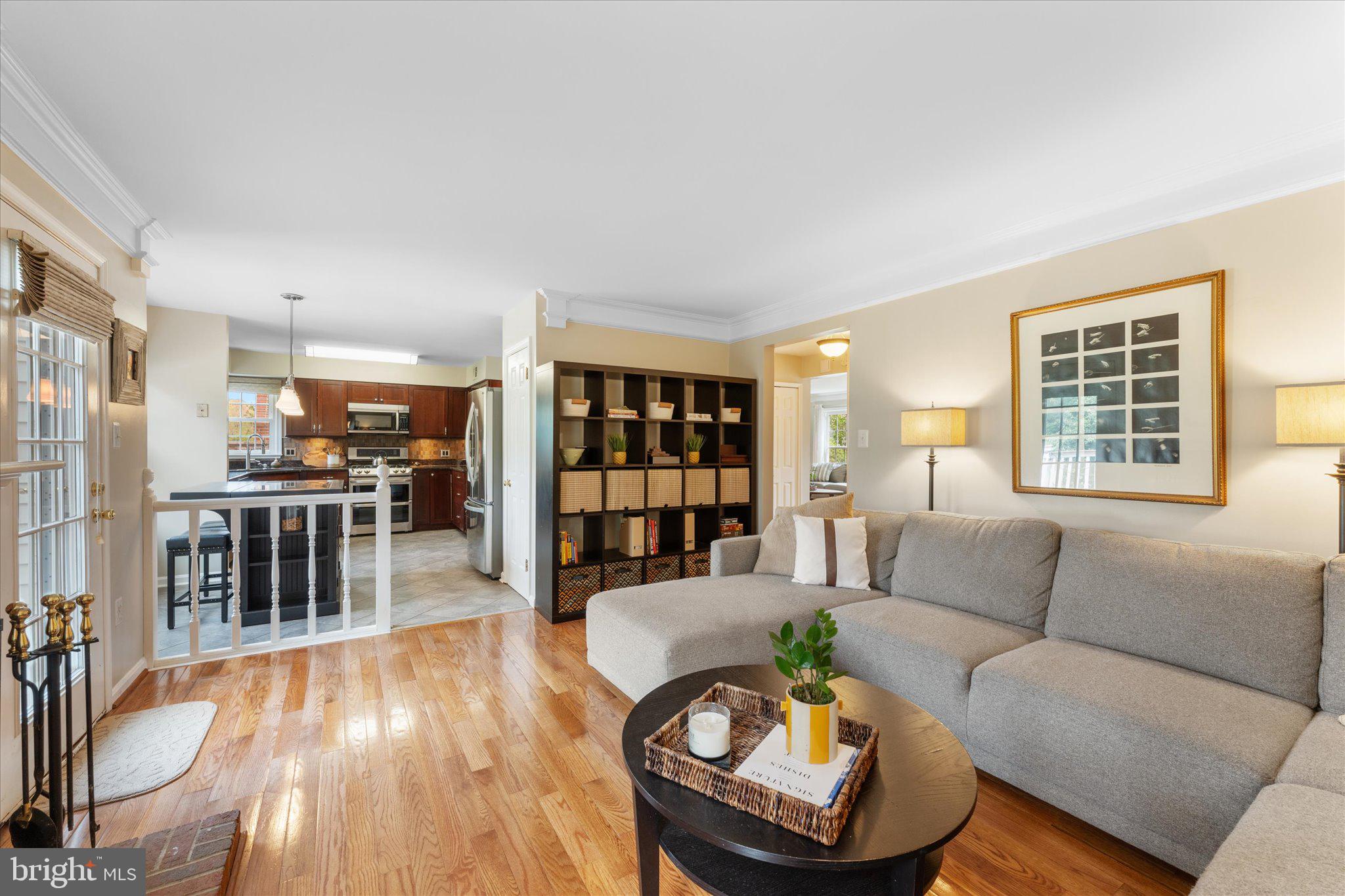 21047 Barcroft Way Sterling, VA 20164 - Photo 16 of 47 a living room with furniture and wooden floor