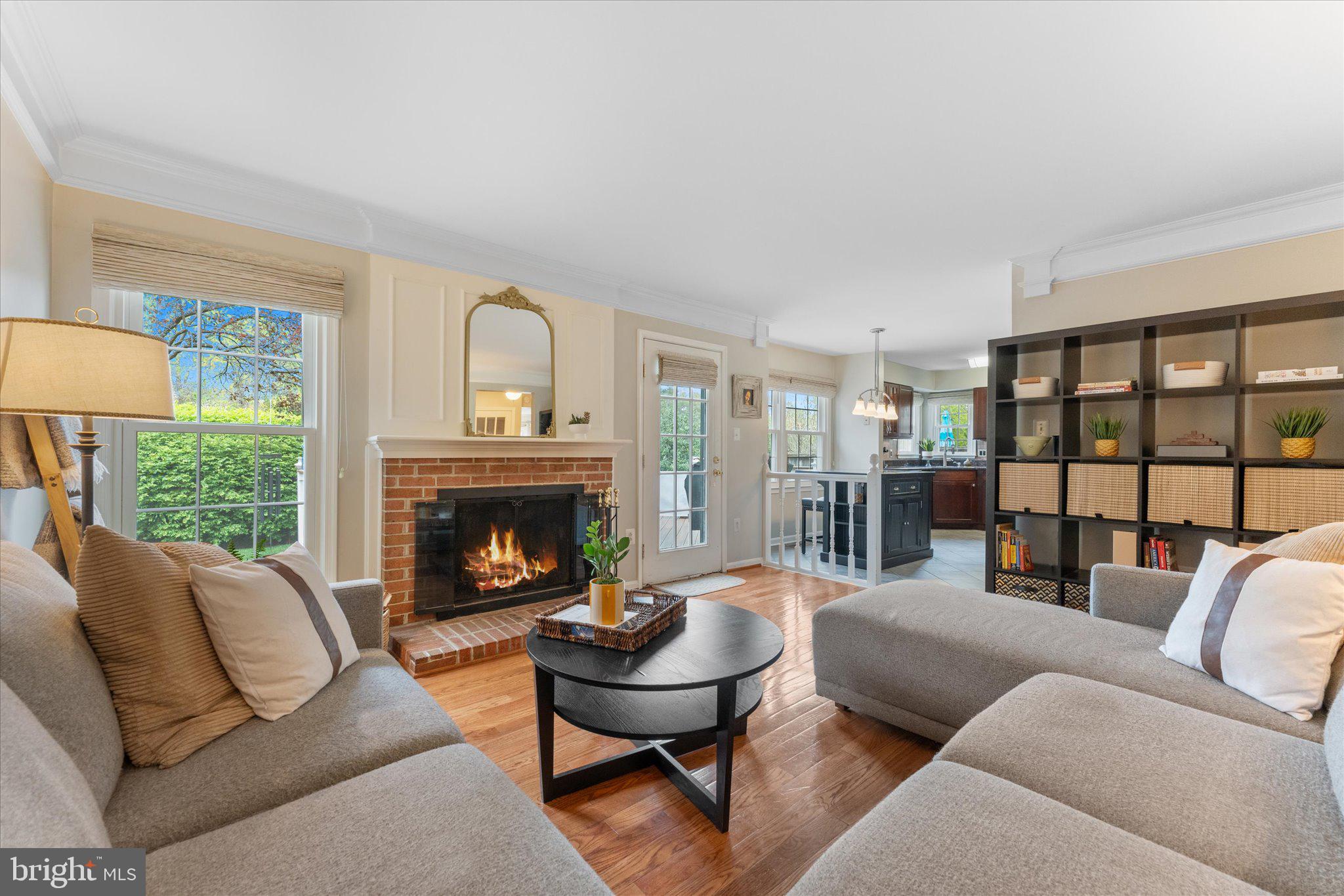 21047 Barcroft Way Sterling, VA 20164 - Photo 17 of 47 a living room with furniture and a fireplace