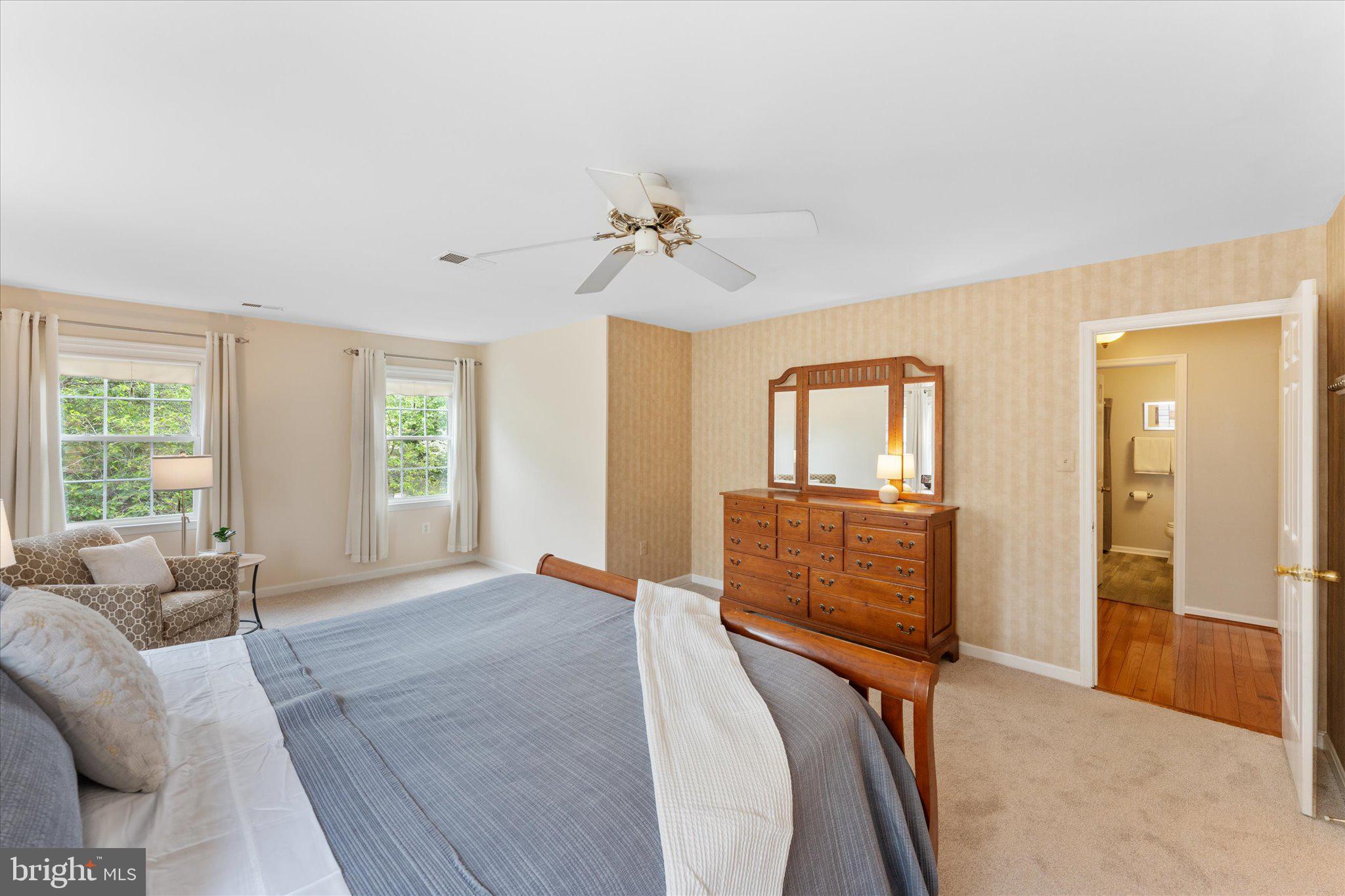 21047 Barcroft Way Sterling, VA 20164 - Photo 24 of 47 a bedroom with furniture and windows