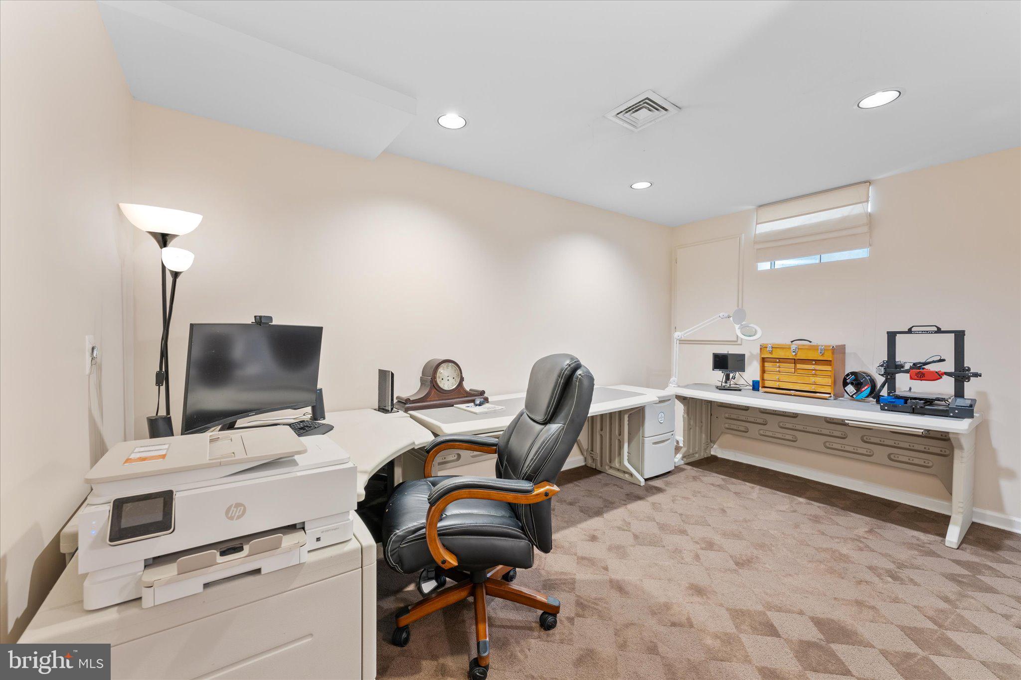 21047 Barcroft Way Sterling, VA 20164 - Photo 36 of 47 a room with furniture and a flat screen tv