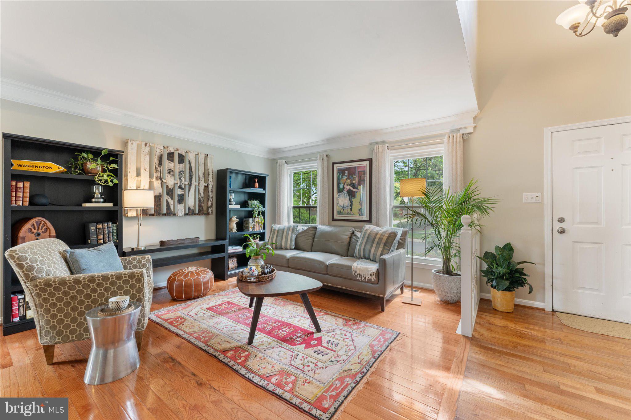 21047 Barcroft Way Sterling, VA 20164 - Photo 5 of 47 a living room with furniture and wooden floor