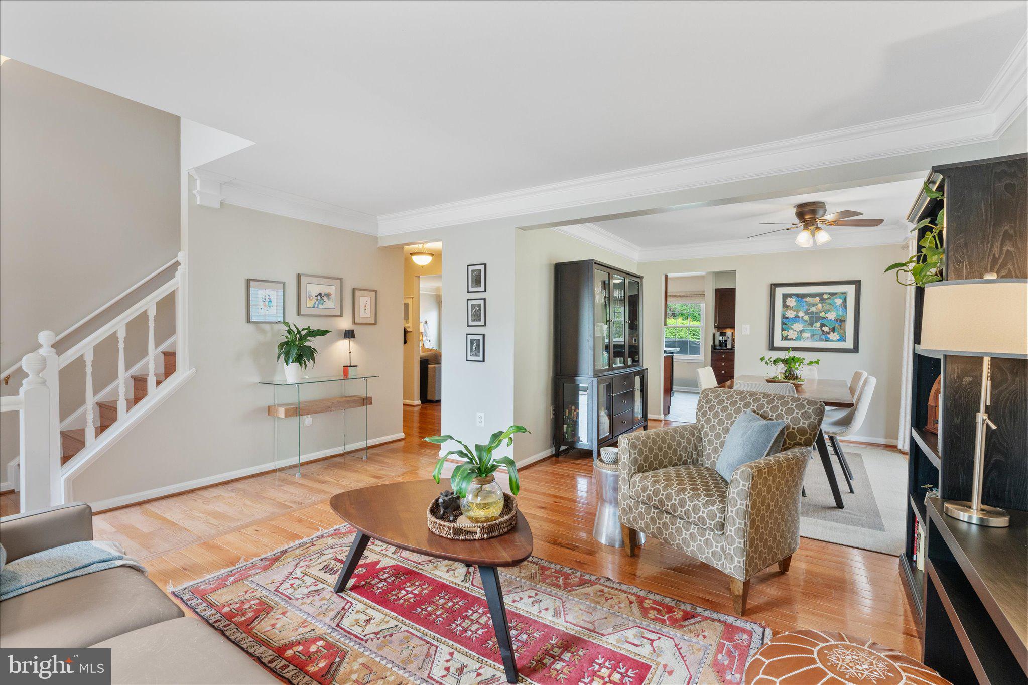 21047 Barcroft Way Sterling, VA 20164 - Photo 7 of 47 a living room with furniture and a rug
