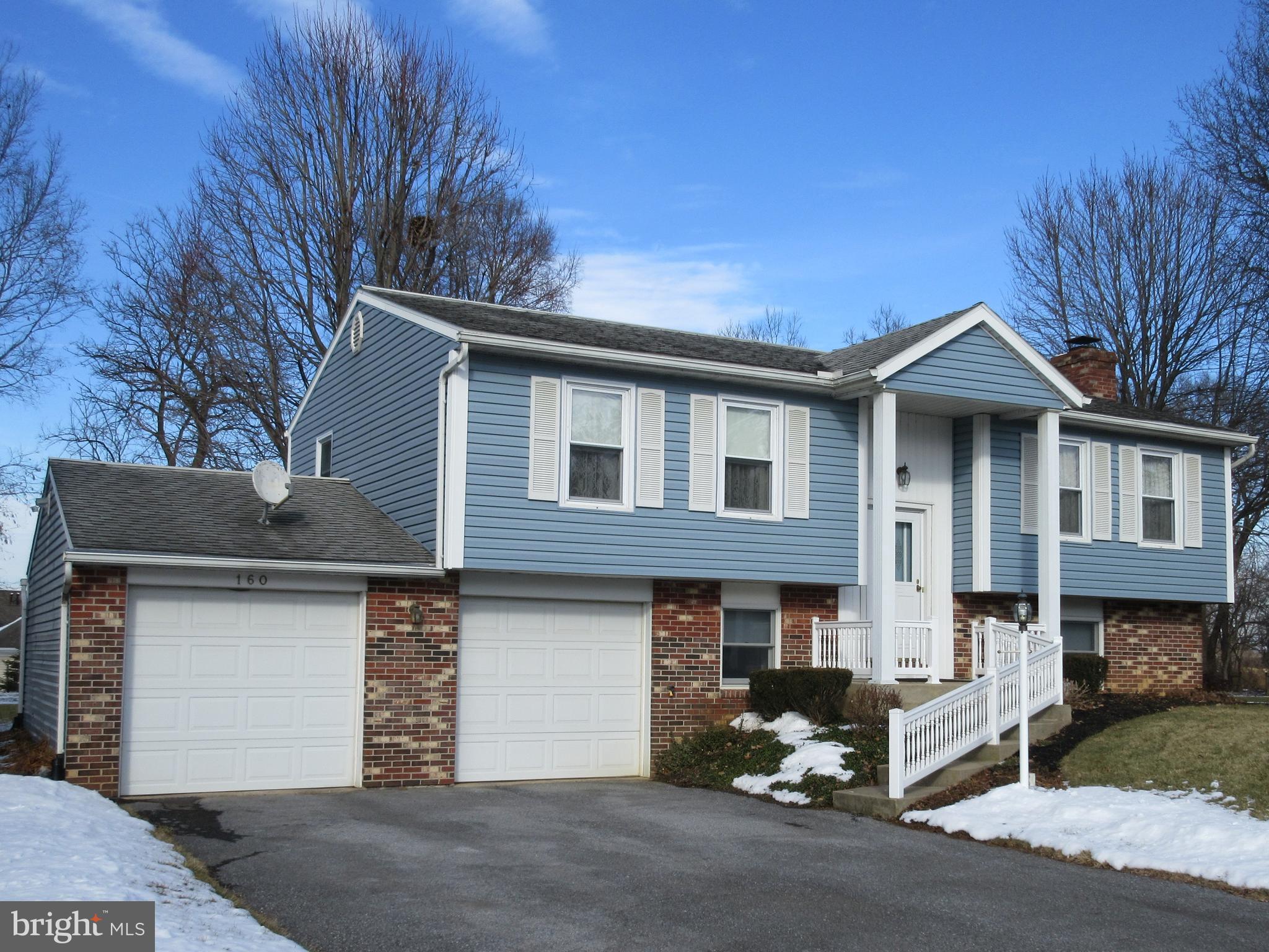 160 April Lane Lititz, PA 17543 - Photo 1 of 27 a front view of a house with a yard