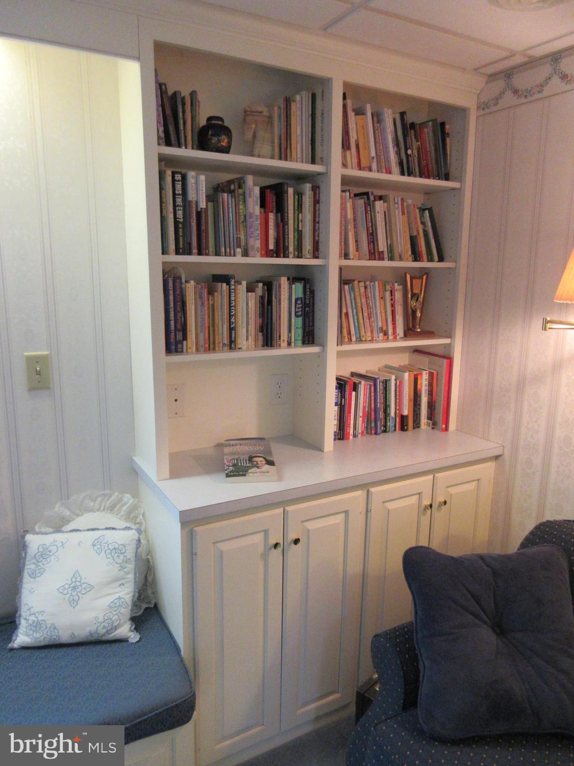 160 April Lane Lititz, PA 17543 - Photo 17 of 27 a living room with furniture and a book shelf