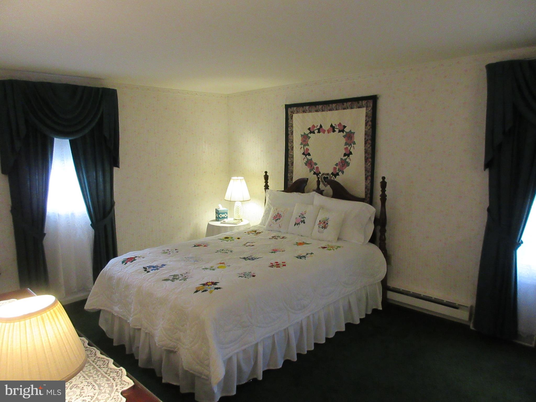 160 April Lane Lititz, PA 17543 - Photo 7 of 27 a bed sitting in a bedroom next to a window