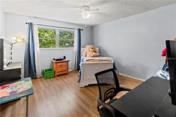 a workspace with furniture and a window