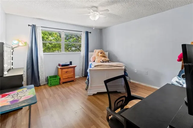 a workspace with furniture and a window