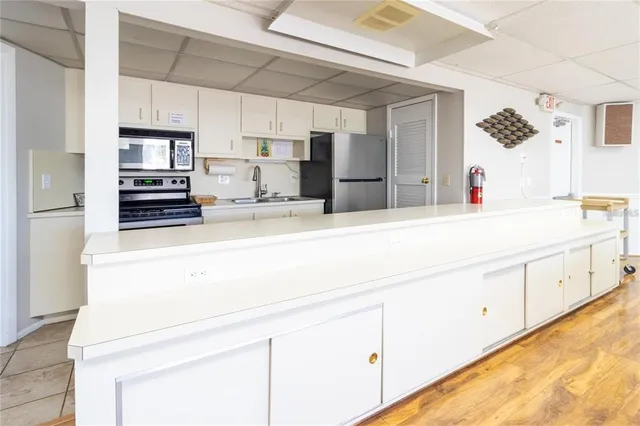 a room with furniture and a book shelf