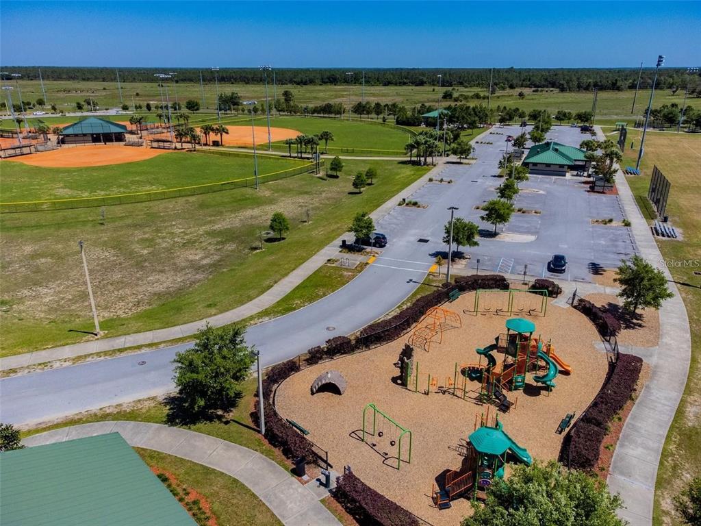 2159 Rio Grande Canyon Loop Poinciana, FL 34759 - Photo 20 of 25 an aerial view of a house with a swimming pool