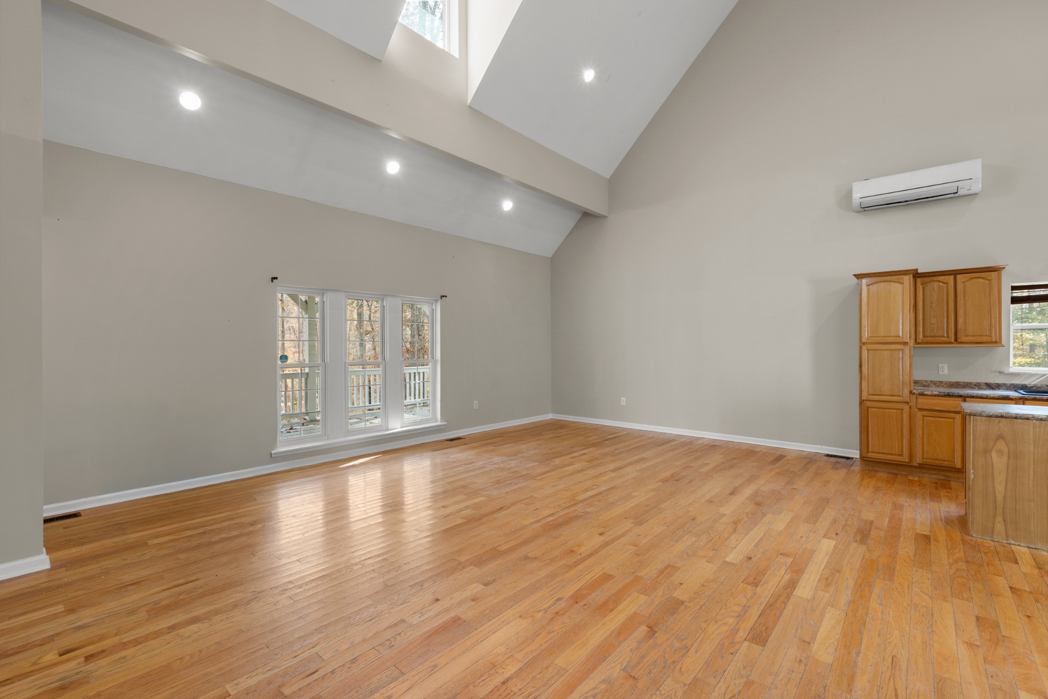 1148 Stoltz Road Centerville, TN 37033 - Photo 19 of 63 a view of empty room with wooden floor and fireplace