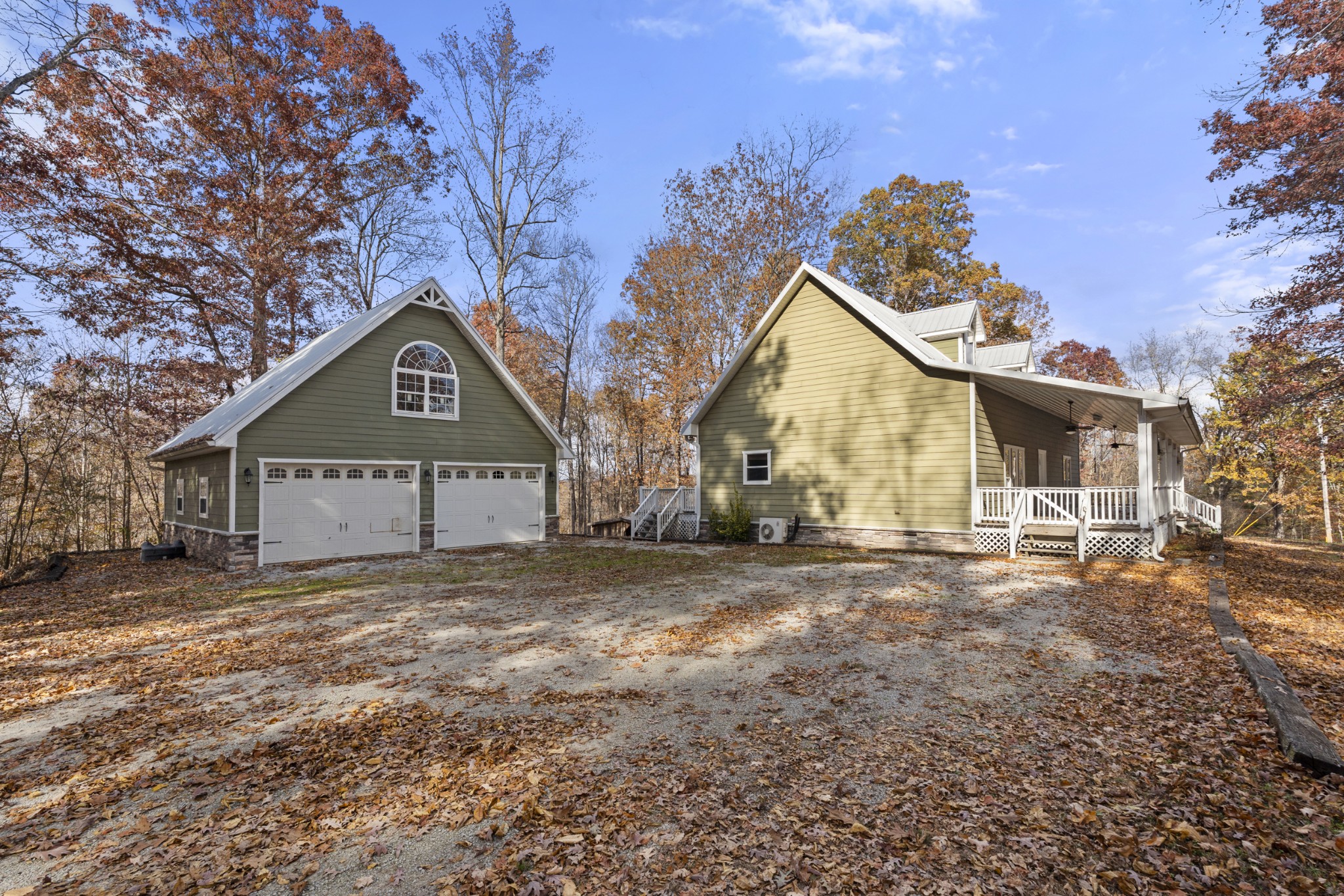 1148 Stoltz Road Centerville, TN 37033 - Photo 5 of 63 a front view of a house with a yard and garage