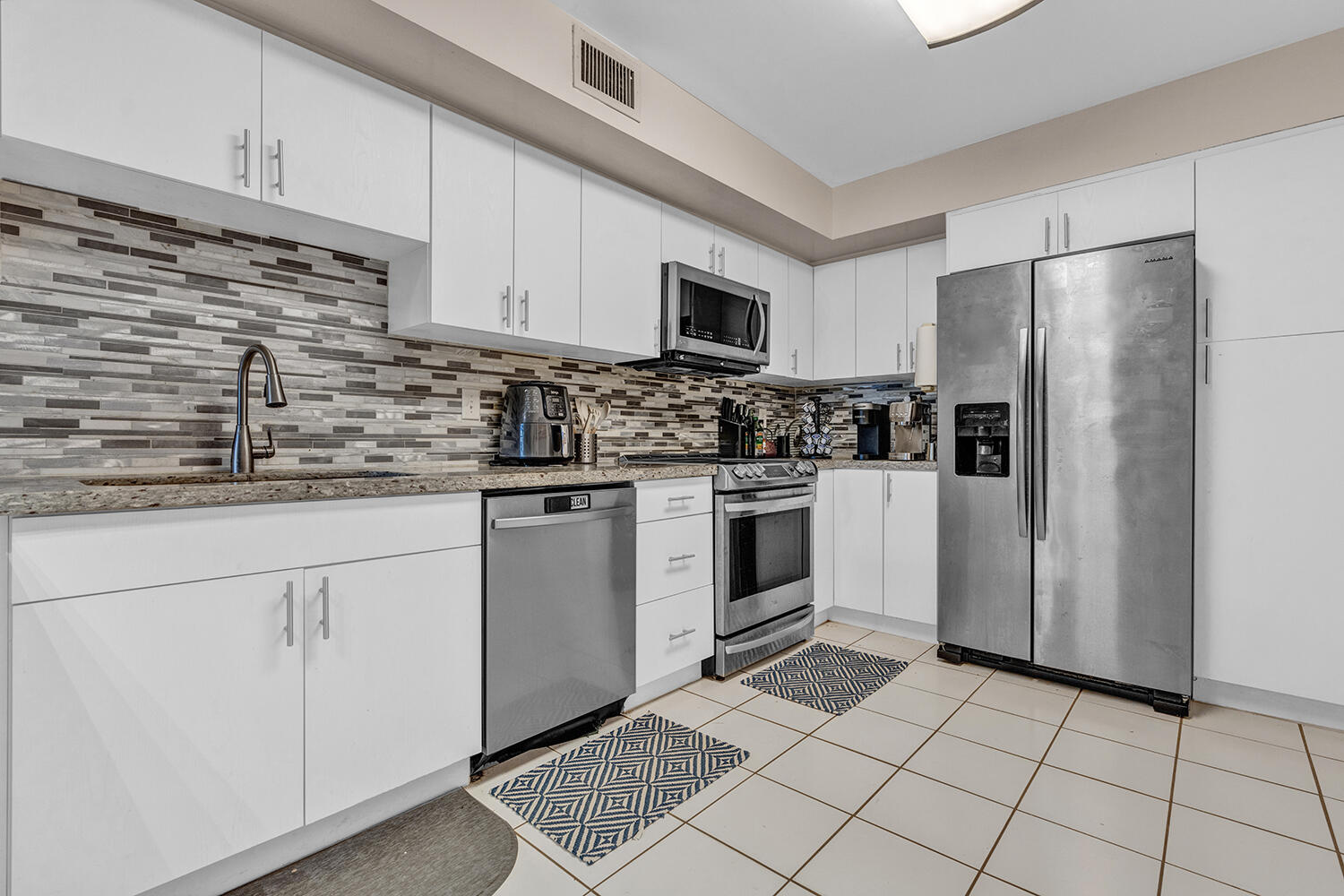 3191 Leewood Terrace, Unit L138 Boca Raton, FL 33431 - Photo 10 of 46 Kitchen