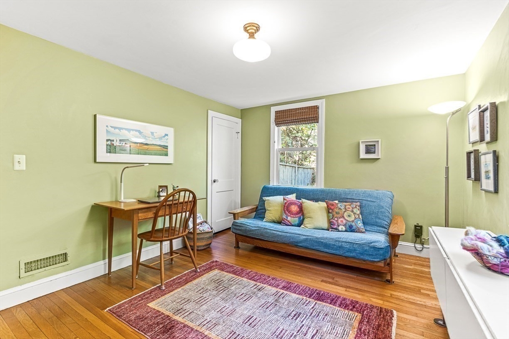 281 Cochituate Road Wayland, MA 01778 - Photo 18 of 38 a living room with furniture and rug