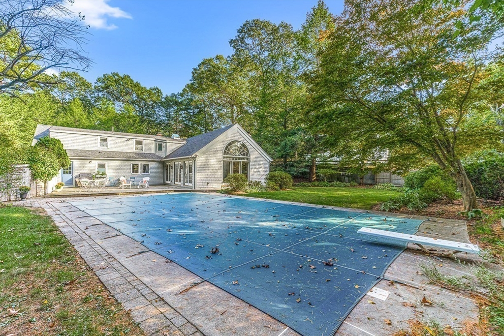 281 Cochituate Road Wayland, MA 01778 - Photo 29 of 38 a front view of a house with garden