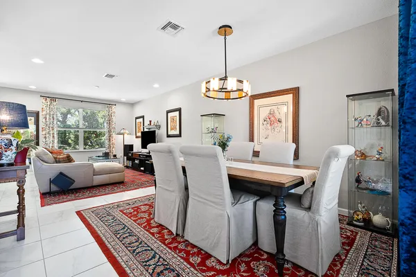 a view of a dining room with furniture