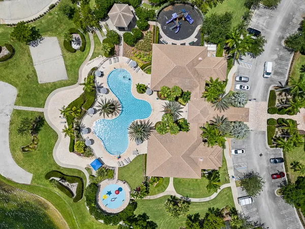 an aerial view of a golf course with plants