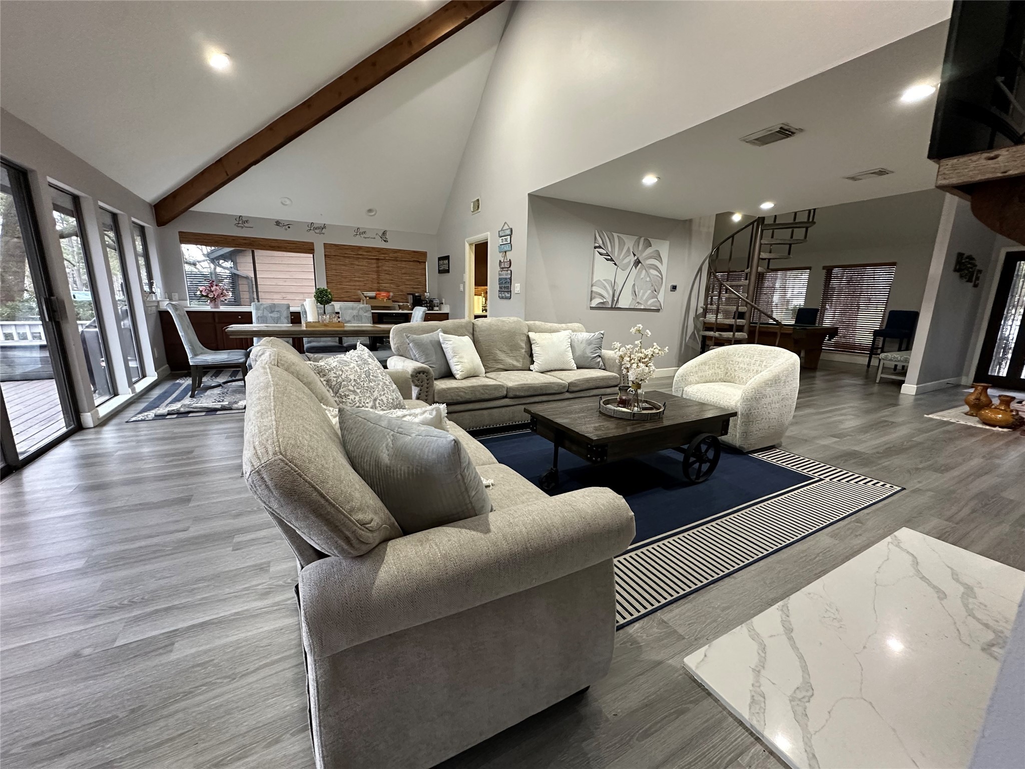 3007 Willowbend Road Montgomery, TX 77356 - Photo 15 of 43 a living room with furniture and wooden floor