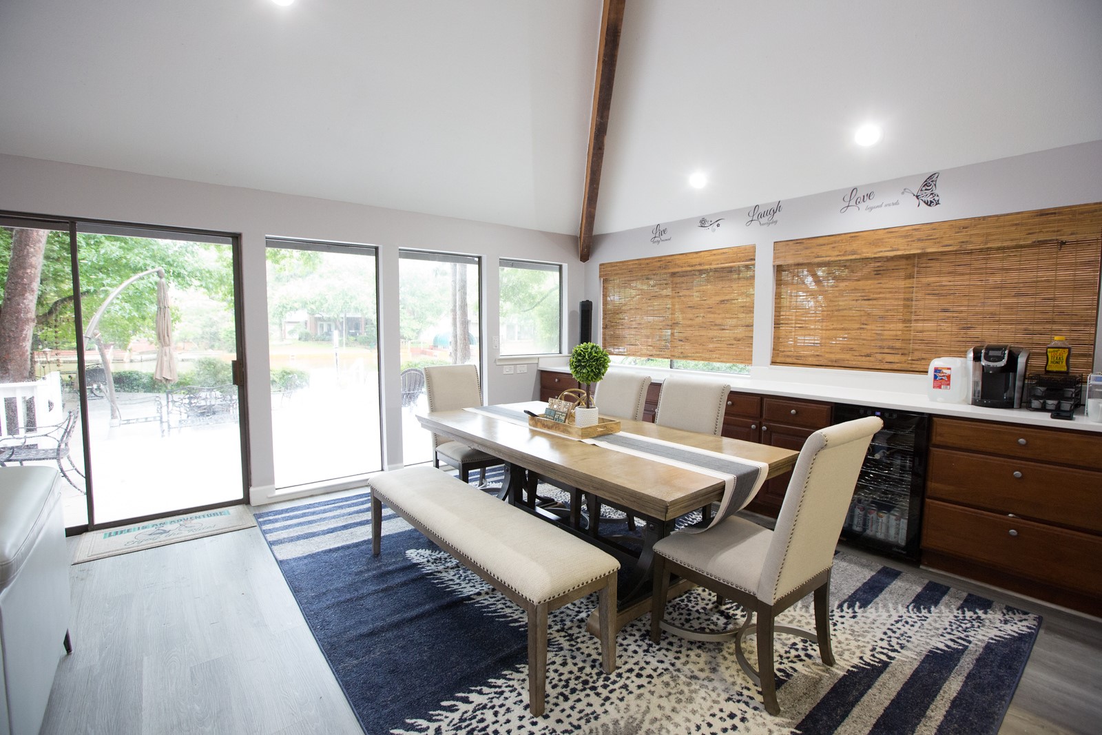 3007 Willowbend Road Montgomery, TX 77356 - Photo 16 of 43 a view of a dining room with furniture window and wooden floor