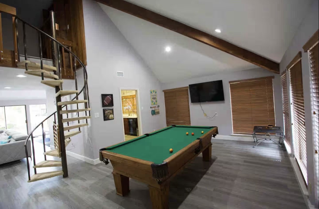 3007 Willowbend Road Montgomery, TX 77356 - Photo 19 of 43 a room with pool table and windows