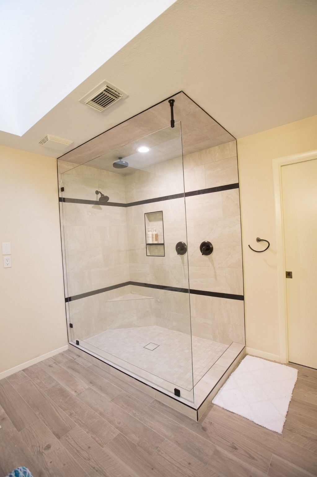 3007 Willowbend Road Montgomery, TX 77356 - Photo 24 of 43 a bathroom with a glass shower door and a window