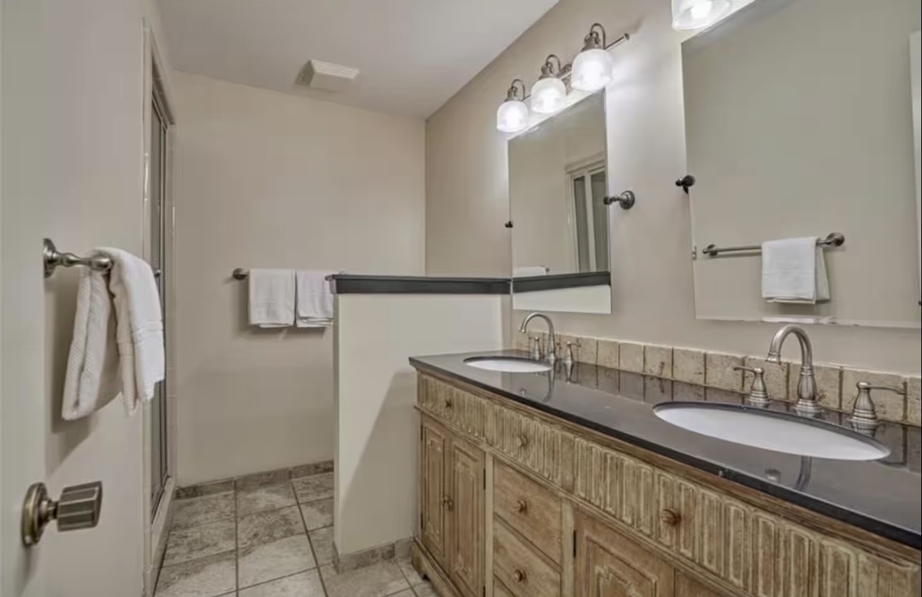 3007 Willowbend Road Montgomery, TX 77356 - Photo 29 of 43 a bathroom with a sink double vanity and shower