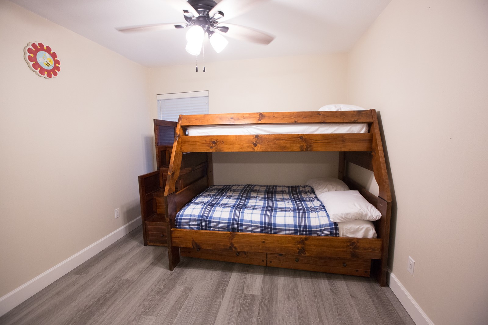 3007 Willowbend Road Montgomery, TX 77356 - Photo 32 of 43 a room with wooden floor and ceiling fan