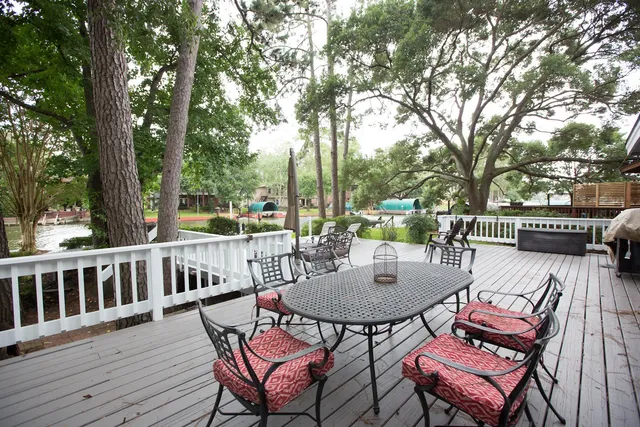 a view of a chairs and table in the deck