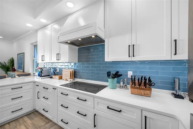 a bathroom with a sink a toilet a mirror and shower