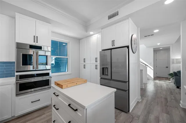 a bathroom with a shower a toilet and a shower