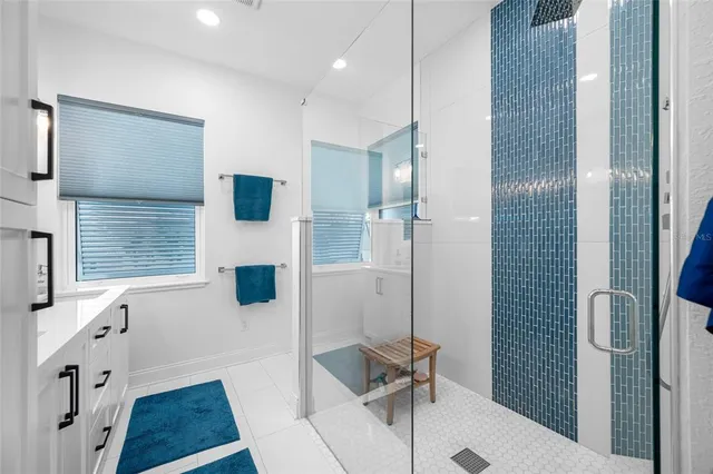 a view of entryway with wooden floor and stairs