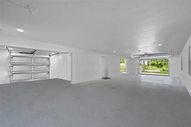 a front view of a house with a yard and a outdoor space