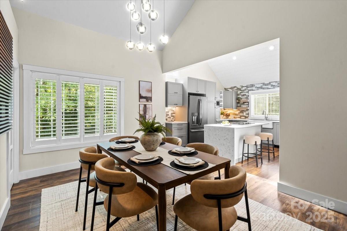 4308 Rounding Run Road Charlotte, NC 28277 - Photo 15 of 48 a view of a dining room with furniture window and outside view