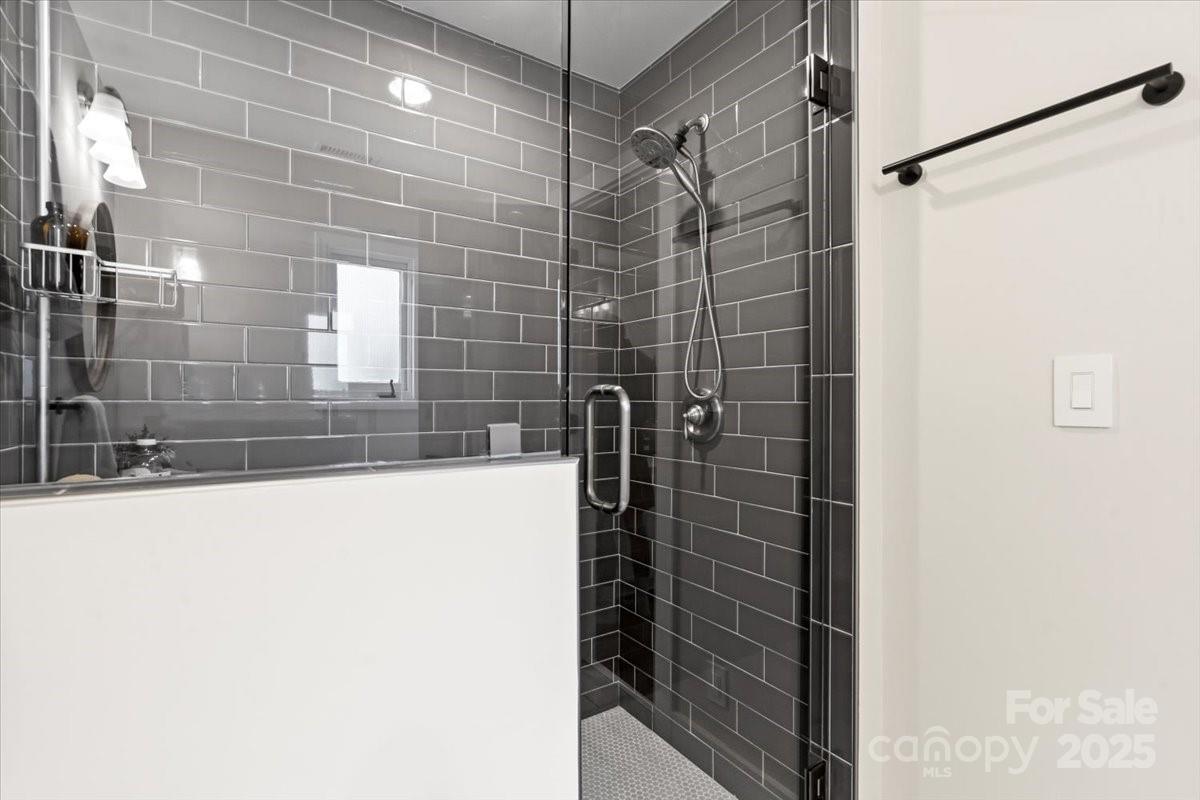 4308 Rounding Run Road Charlotte, NC 28277 - Photo 28 of 48 a bathroom with a shower and a sink