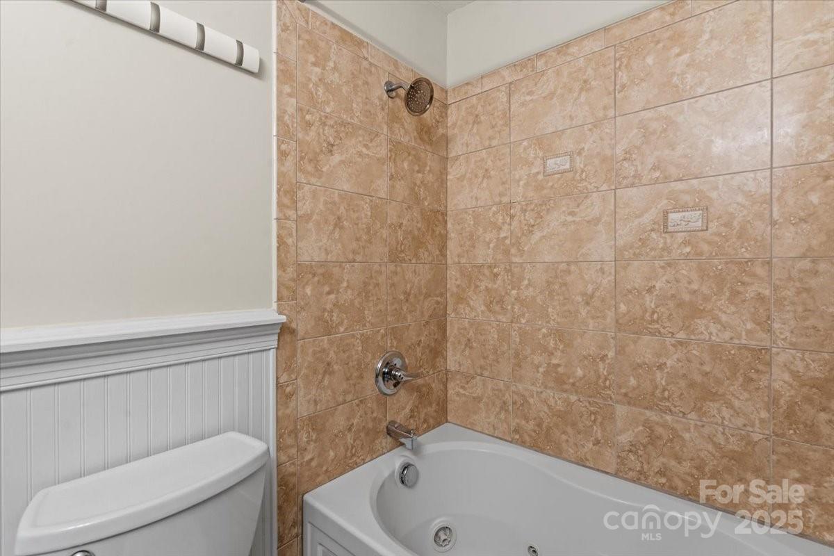 4308 Rounding Run Road Charlotte, NC 28277 - Photo 33 of 48 a bathroom with a toilet and a shower